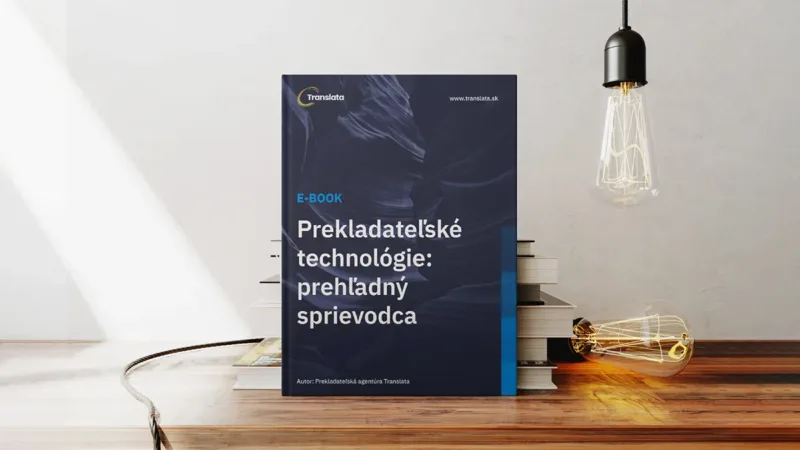 Titulná strana Translata e-booku Prekladateľské technológie na stole pri knihách